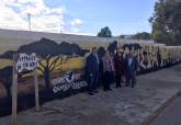 Visita a los murales artsticos de El Llano del Beal, Estrecho de San Gins y El Beal, para promocionar la Cueva Victoria