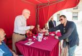 Mesa Petitoria de Critas en la Plaza del Ayuntamiento