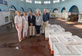 Entrega de lotes de pescado a asociaciones benficas de Cartagena