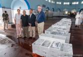 Entrega de lotes de pescado a asociaciones benéficas de Cartagena