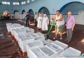 Entrega de lotes de pescado a asociaciones benéficas de Cartagena