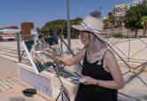 Visita de la concejala de Turismo de Helln con un stand en el puerto de Cartagena