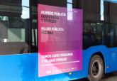 Cartel en autobuses de la campaña por el Día Internacional para la Eliminación de la Violencia hacia las Mujeres