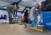 Entrega de alimentos donados por Estación Madrid de Santa Ana