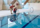 ltimos preparativos de la piscina del Palacio de Deportes.