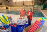 Últimos preparativos de la piscina del Palacio de Deportes.