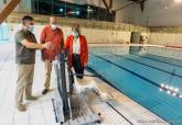 Últimos preparativos de la piscina del Palacio de Deportes.