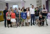 El local social de la barriada Virgen de la Caridad acoge el quinto Encuentro con Personas Mayores