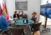 Reuni�n por videoconferencia sobre migraci�n y hospital Naval.