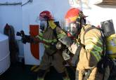 Ejercicio de emergencia en puerto y auxilio exterior de los buques de la Armada en Arsenal de Cartagena con el apoyo de los Bomberos de Cartagena y Emergencias Sanitarias 061