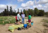 Limpieza medioambiental en el bosque romano. 