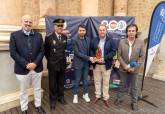 El concejal de Deportes, José Martínez (c), durante la presentación de la carrera Cuatro Santos en el Museo del Teatro Romano de Cartagena.