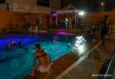 D�a internacional de la Juventud. Piscina de noche nocturna en Casa de la Juventud